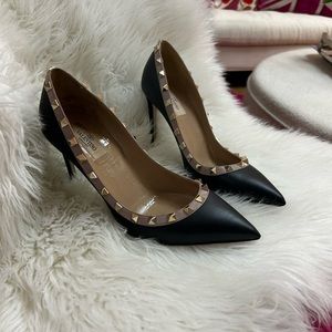 Valentino Rockstud accents. Black with tan detail. Pointed toe heels